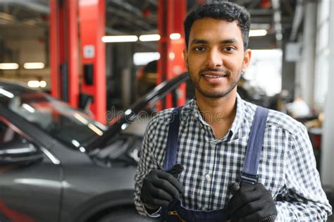 Happy Auto Mechanic Man Or Smith At Car Workshop Stock Photo Image Of