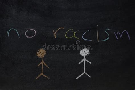 The Words No Racism And Sketch Of Two People Written On A Blackboard