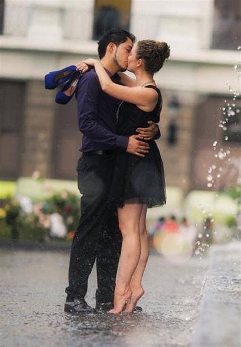 Twirling During The 2014 Storm Kissing In The Rain Couples In Love Kiss And Romance