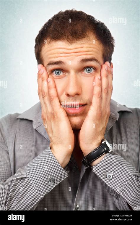 Face Of Surprised Amazed Young Man Stock Photo Alamy