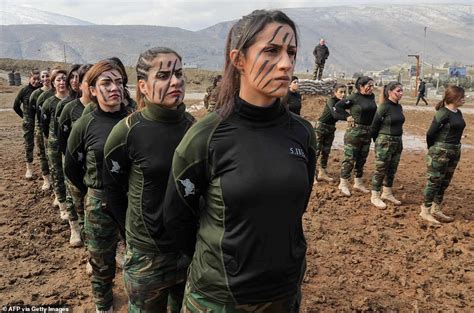 Kurdish Female Officer Tears Into A Snake And A Rabbit With Her Teeth