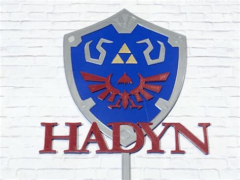 Breath of the wild releasing for the nintendo switch. Zelda Hylian Shield Personalized Birthday Cake Topper - 3D Wade Creations