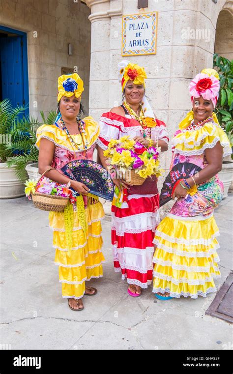 Cuban Women With Traditional Clothing In Old Havana Stock Photo