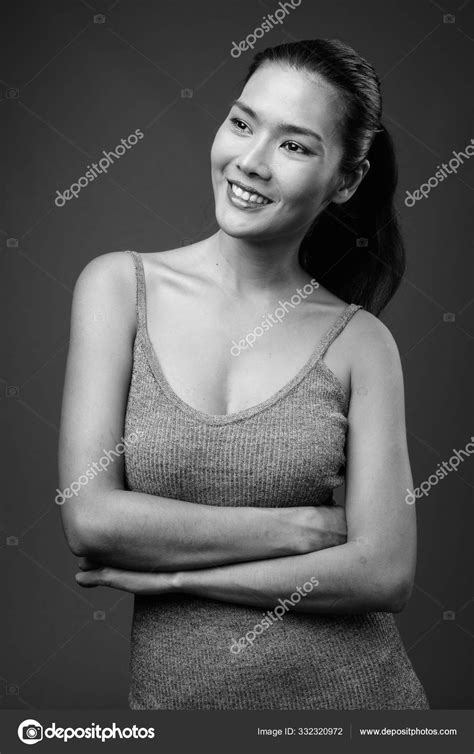 Studio Shot Beautiful Asian Woman Wearing Sleeveless Dress Gray