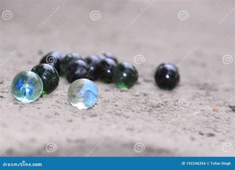 Colorful Marbles Played By Children In Indian Village Stock Photo