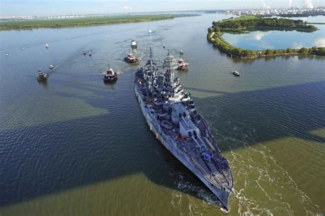 The Uss Texas Is Towed Down The Houston Ship Channel Wednesday Aug 31