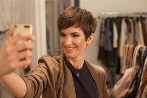 best pixie cuts short hair cuts neutral outfit confident woman pixies short hairstyles