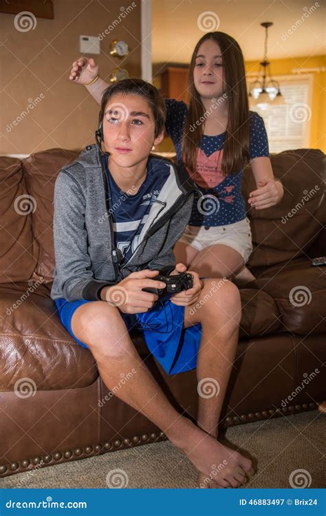 brother and sister sneak attack stock image image of sister sitting 46883497