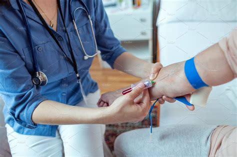 Closeup Of Nurse Taking Blood Sample Health And Medical Stock Photos