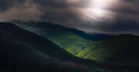 Green Mountains Under Dark Sky · Free Stock Photo