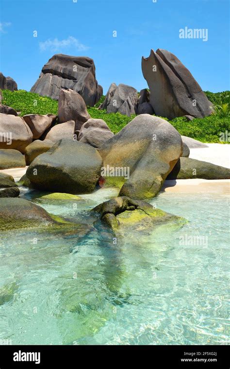 Anse Marron Beach With Big Granite Boulders On La Digue Island