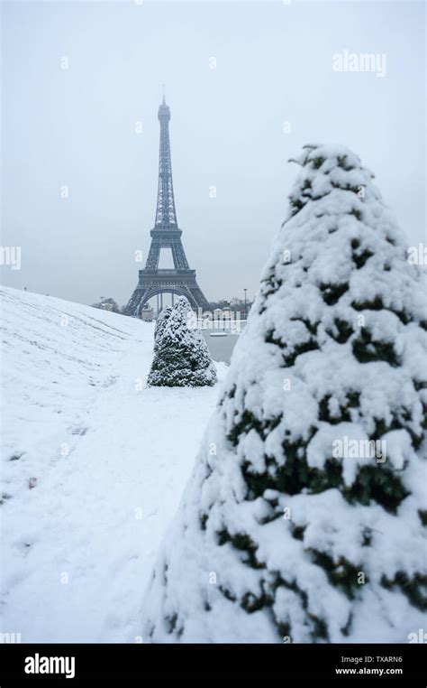 The Eiffel Tower In The Snow In Paris France Stock Photo Alamy