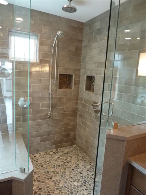 Last time we left off, steve wartman and his crew had finished installing the bathroom fan, and the previous day they had hung concrete board in the shower and fir plywood. How to Install Pebble Tiles in Your Washroom ...