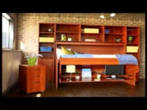 Most of the computer desks i've seen have a couple things in common: The Coolest Hideaway Desk Bed - YouTube