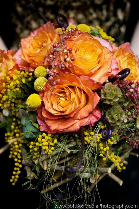 Maybe you would like to learn more about one of these? Rustic bridal bouquet of orange free spirit roses with ...