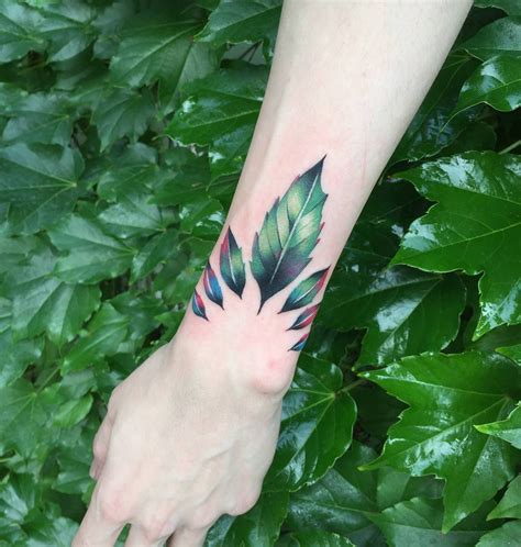 Beautiful Green Leaves Tattoo On The Left Wrist Anklet Tattoos Up