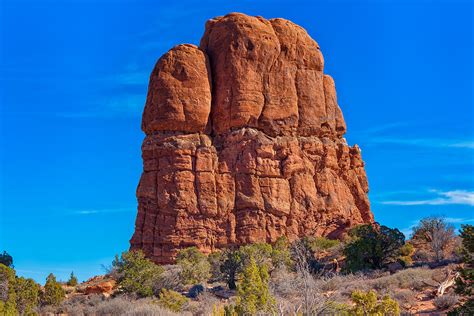 Massive Rock Formation At Arches Ntional Park Photograph By John M Bailey