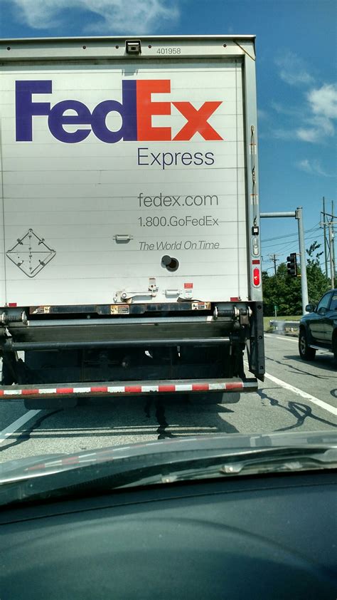 Trucks only should use caution b. What is the opening on the back of this FedEx truck for ...