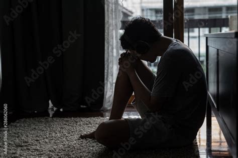 Wide Shot Young Adult Asian Loneliness Sad Man Sitting On The Floor In