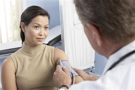 Measuring Blood Pressure Photograph By Adam Gault Fine Art America