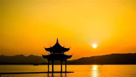 The Beautiful Of Silhouette Sunset Landscape Scenery Of Xihu West Lake