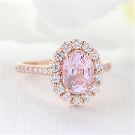 Large Champagne Pink Sapphire Engagement Ring In Rose Gold Halo Cluster