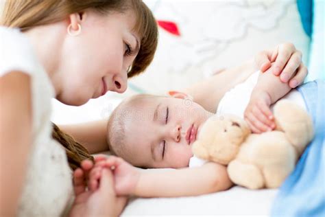 Happy Mother Cuddling Her Newborn Baby Stock Image Image Of Cute