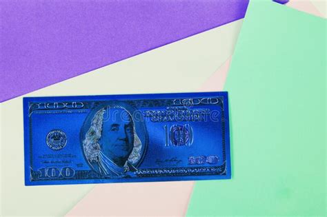 A Blue Hundred Dollar Bill On Colored Paper Stock Photo Image Of