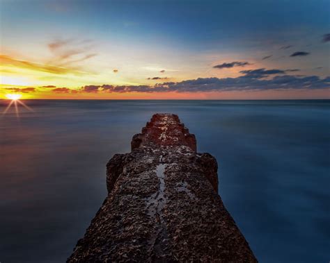 Download Wallpaper 1280x1024 Breakwater Sea Skyline Sunset Standard