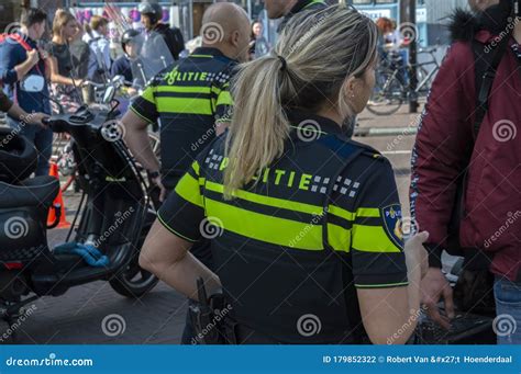 Backside Of A Police Woman At Amsterdam The Netherlands 2019 Editorial