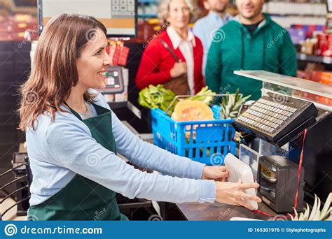 Cashier At Checkout Is Using Barcode Scanner Stock Photo Image Of