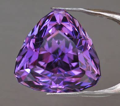 Kunzite is known for its strong pleochroism showing light or intense coloring in different directions. All That Glitters: Gemstone Photographs - Kunzite (Pink ...
