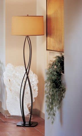 Wrought iron lamps are available in old world, rustic, and contemporary styles. Wrought Iron Rustic Floor Lamp - Foter