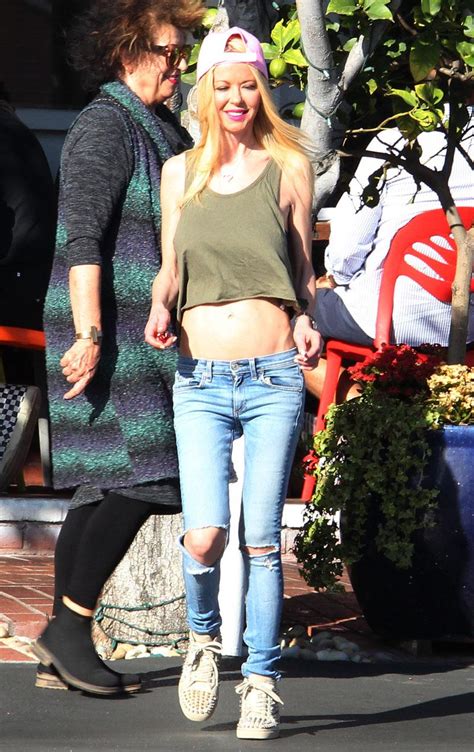 Toothpick Tara Reid Shows Off Bloated Belly For New Mystery Man