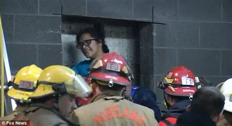 woman trapped between two walls in portland apologizes and thanks rescuers but still won t say