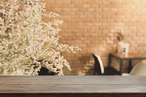 Premium Photo Wood Table Top And Blurred Bokeh Cafe And Coffee Shop