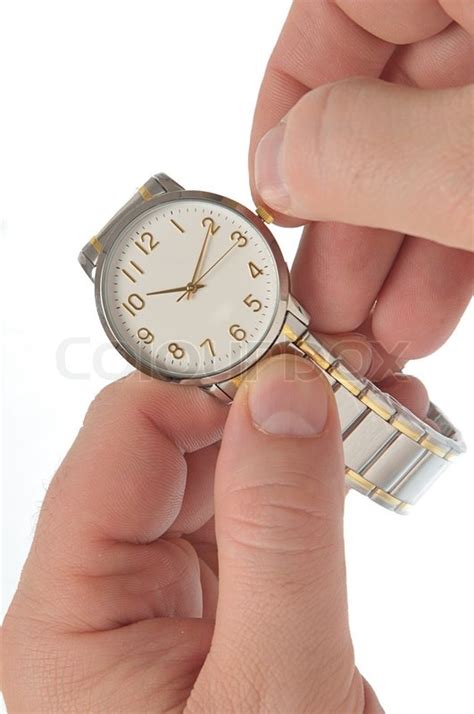 Right Hand Puts Time On Wristwatch Left Stock Photo Colourbox