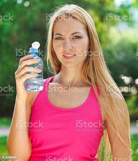 Woman Drinking Water After Fitness Exercise Stock Photo Download