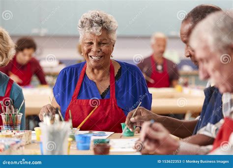 Portrait of Retired Senior Woman Attending Art Class in Community