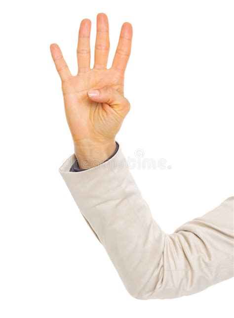Closeup On Hand Of Business Woman Showing Four Fingers Stock Photo