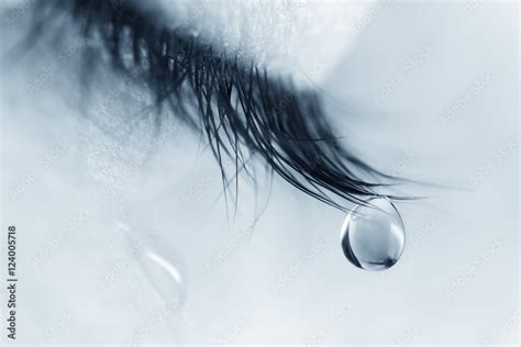 Sad Woman Concept Closed Eyelid Closeup With A Teardrop On Eyelashes