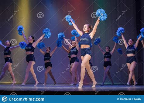 Athletes Perform On Stage, Young Cheerleaders Perform At 