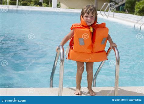 Happy Smiling Child Girl In Inflatable Life Jacket Stock Photo Image
