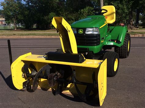 The john deere e100 series is a logical progression of the d100 series you are all familiar with. John deere lawn tractor snow blower reviews