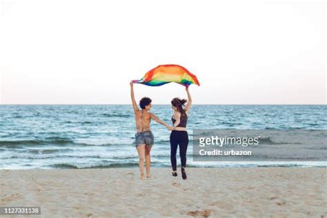 lesbians beach photos and premium high res pictures getty images