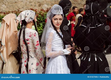 Beautiful Georgian Lady In Traditional Retro Dress Looking People In Crowd Of Events During