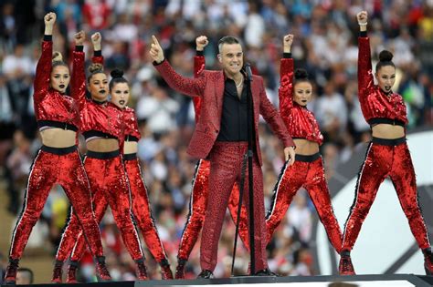 robbie williams kicks off world cup with obscene gesture abs cbn news