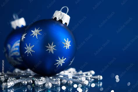 Blue Christmas Ornaments On Blue Background Merry Christmas Greeting