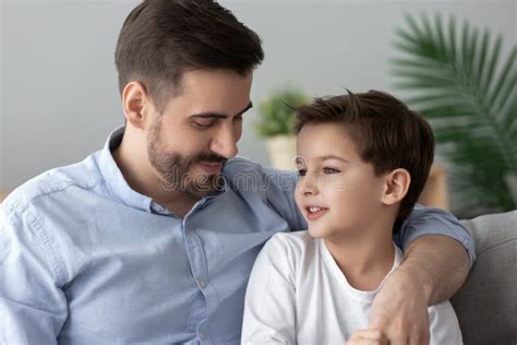 Loving Father Hugging Talking With Little Son Spending Time Together Stock Image Image Of