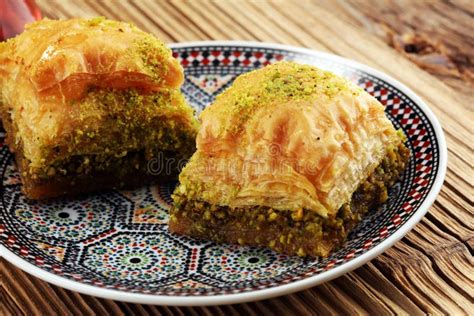 Turkish Dessert Baklava With Pistachio On Wooden Table Stock Photo